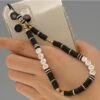 Edle Handykette Boracay 1 Edle Handykette Boracay -Herz Schmuck Geschaft Handyketten Phonecase Accessoires Handykette Handyschmuck Handy handycover Iphone samsung Android Farbige Perlen schwarz gold weiss Love Boracay 1