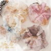 Scrunchie Agua Flores 2 Scrunchie Agua Flores -Herz Schmuck Geschaft Scrunchie haargummi stoff mesh transparent style elegant weich scrunchies viele farben haare haarschmuck agua flores alle 4 782936