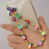 Farbige Handykette Healthy Fruit -Herz Schmuck Geschaft handyketten farbig bunt perlenkette perlen kunstperlen smartphone telefon accessoires kette fruechte apfel erdbeere ananas trauben healty fruit 1 546088